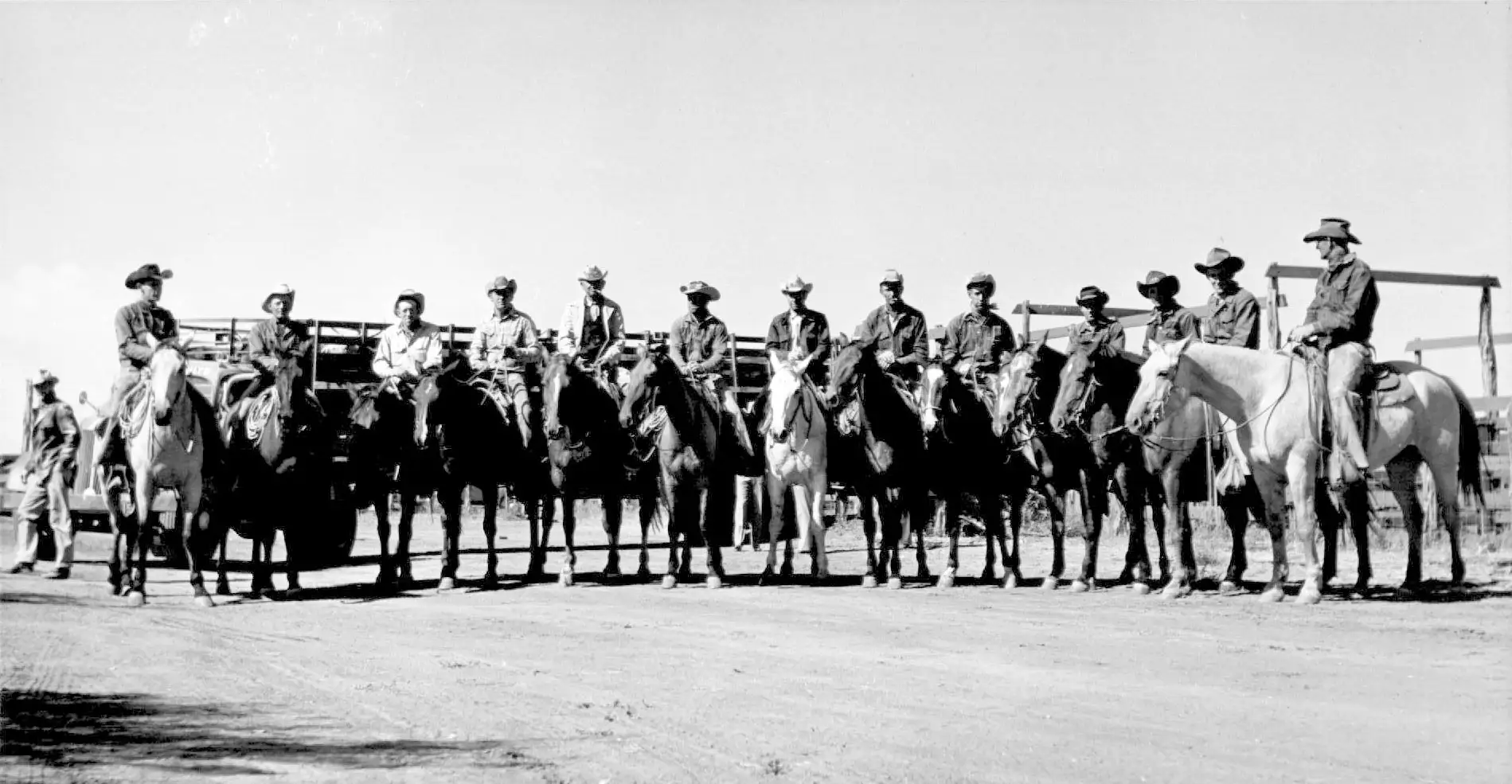 Historical photo of 6666 cattlehands lined up on their horses.